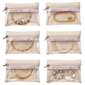 Detail shot of clear window velvet zipper pouch for jewelry storage, portable and neat. - Off White