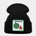 Detailed view of black knitted beanie featuring a square watermelon embroidery patch - Watermelon