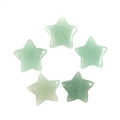 Top view of five polished light green star-shaped natural gemstones on white backdrop - Green Aventurine