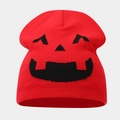 Detail of red knit beanie featuring black Halloween pumpkin face embroidery - Style D Red (Sawtooth Pumpkin)