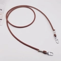 Detailed view of a brown PU leather round shoulder strap with silver metal swivel hooks - Dark Brown + Silver Hook