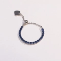 Detail of adjustable silver ring featuring deep blue zircons and a small heart charm - Adjustable Open / Dark Blue Zircon - Platinum Silver
