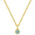 Detail of gold water wave chain with a round light blue birthstone pendant and beaded edge - December