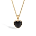 Detail view of a black heart crystal pendant with gold metal chain on a white background - Black Stone Style (FN2279)