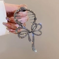 Pinza per capelli in metallo grigio scuro con un grande fiocco di strass brillanti - J82 Fiocco Nero Strass Molletta a Griffe