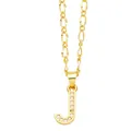 Detail of gold letter J pendant featuring micro-set cubic zirconia on a Figaro chain - Letter J