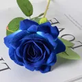 Single artificial velvet rose in deep blue with realistic green leaves for home decor - Blue