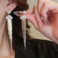 Close-up of silver tassel earrings with sparkling zircons worn by a model - Silver Long Triangle Full Diamond Tassel Style (50# Silver Earring Post - Silver-Triangle)