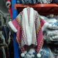 Pink and white knit shawl cloak with wavy patterns and faux fur collar detail - New Pink