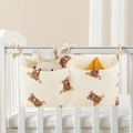 Detail of cotton baby bedside hanging organizer with brown teddy bear print and dual pockets - Bear