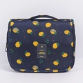 Waterproof hanging toiletry bag in navy blue with lemon patterns and top handle for travel - Navy Lemon