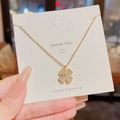 Titanium steel four-leaf clover necklace with sparkling cubic zirconia pavé in gold - X640 Gold Clover Zirconia