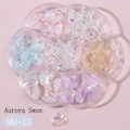 Detail of MH-13 Aurora Swan and bow nail art charms in a petal-shaped storage box - MH-13 Aurora Swan