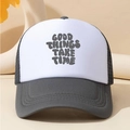 Modern two-tone mesh trucker hat featuring Good Things Take Time text on front - Coffee