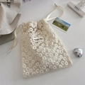 Close-up of white mesh daisy embroidery and ribbon drawstring on the organizer bag - Daisy Embroidery Style / Medium (21x26cm)