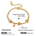 Detail view of gold stainless steel star bracelet with zircon inlay and lobster clasp - Gold Star Pendant Bracelet (JDB0306003)