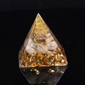 Handmade Orgone pyramid with gold spiral coil, natural crystals and gold foil base - White Phantom