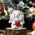 Cute resin Christmas bunny figurine wearing a red hat and holding a heart - Rabbit SD09