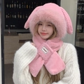 Close-up of pink rabbit ear plush hat and scarf combo with soft faux fur texture - Pink