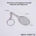 Silver metal tennis racket keychain with 7.7cm total length and 11g lightweight design - Keychain style / Silver Tennis Racket