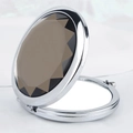 Portable folding round makeup mirror with silver metal frame and brown faceted gemstone - Diamond Round Mirror Silver Frame Brown Gem