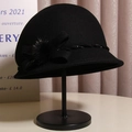 Elegant black wool cloche hat with velvet bow and faux fur pompom decoration - Size M (Adjustable) / Black
