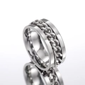 Macro view of silver spinning ring featuring polished cuban link chain detail - US 7 / Steel