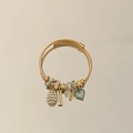 Bracciale regolabile in acciaio dorato intrecciato con ciondolo a cuore e perle - Cuore blu