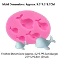 Pink silicone whale mold with blue resin samples and precise measurement details - Style 6 (Dolphin)