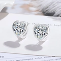 Sparkling silver heart-shaped stud earrings with clear faceted stones on a soft white background - White Diamond Heart-shaped Earrings Led-87
