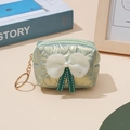 Detail of mint green quilted mini pouch with white mesh bow and golden keychain - Olive Green