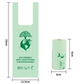 Biodegradable corn starch dog waste bags in light green with handle and size details - 2 Microns Fully Biodegradable Vest Style