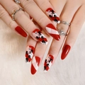 Faux ongles stiletto longs avec motifs de crânes et d'os en rouge, noir et blanc - 1267