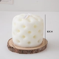 White geometric scented candle with diamond texture on a rustic wood stand - Sofa Tufted Texture (Tuberose) / White