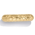 Detail of golden metal hair clip featuring irregular hammered texture on a long bar design - Gold Hairpin 1090567