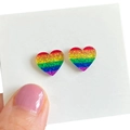 Rainbow glitter resin heart stud earrings displayed on a white card for a festive look - Rainbow Style