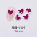 Macro shot of silver heart nail charms featuring sweet lettering in rose red and silver - Heart Silver Rose Red Style (9496)