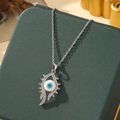 Silver evil eye pendant necklace with blue eye element and white zircons on chain - A3-Silver