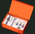 Luxury women's quartz watch set with blue crystal accents in an orange gift box - Silver/Blue Set