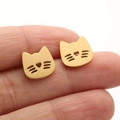 Cute hollow heart cat stud earrings in gold finish shown held for size perspective - Gold Cat (661)