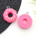 Pink resin donut pendants with colorful sprinkles and metal loops for DIY jewelry making - Rose Red Donut