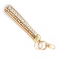 Handwoven cream and gold wristlet strap with pyramid studs and gold metal clasp - Gold