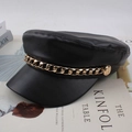 Close-up of matte black leather baker boy hat with a textured gold metal chain detail - One Size 58cm / Black Diamond Chain Style