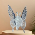 Silver moving butterfly hair clip with hollow wings on a round pedestal stand - Car Decor Style / Silver