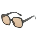 Oversized polygonal sunglasses with black frame and light brown lenses in 45-degree view - Universal Specification / Black Frame Champagne Lens