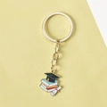 Elegant graduation keychain featuring a gold ring with doctoral cap, books, and scroll charms - Style 2 (Flat Ring)
