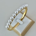 Modern 18K gold plated stainless steel bracelet with a row of white pearls and zircon crystals - Pearl Gold Bangle