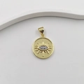 Golden round evil eye pendant with sparkling zircon stone on a white surface - Round Eye Opal DL0141