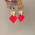 Detail view of triple-layered geometric rhombus earrings with red paint and crystals - 55# Silver Pin - Gold Red