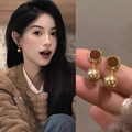 Vintage geometric earrings with brown stones and gold pearls shown on model and in hand - 5# Gold Rounded Square Brown Pearl Studs